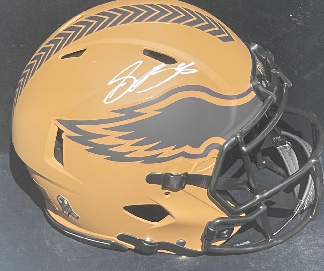 Sequon Barkley Signed Pro Authoc Salute To Warriors Full Size Helmet.  The signature is certified by JSA Authentics