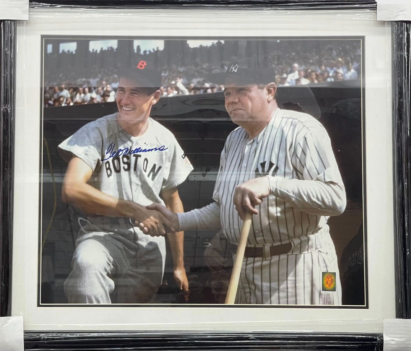 This is a 20” x 24” photo which features both Ted Williams & Babe Ruth. Custom Framed